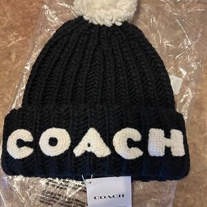 Coach hand knit cable cuff hat
